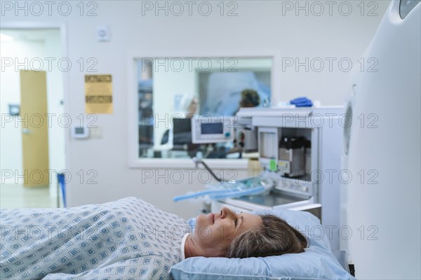 Caucasian patient laying at scanner