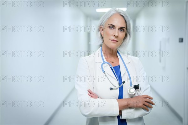 Portrait of confident Caucasian doctor in hospital