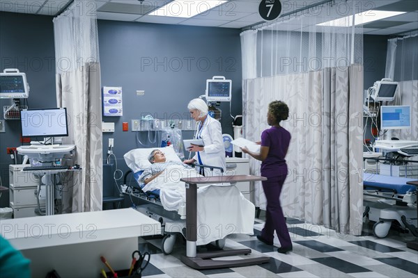 Doctor and nurse with patient in hospital