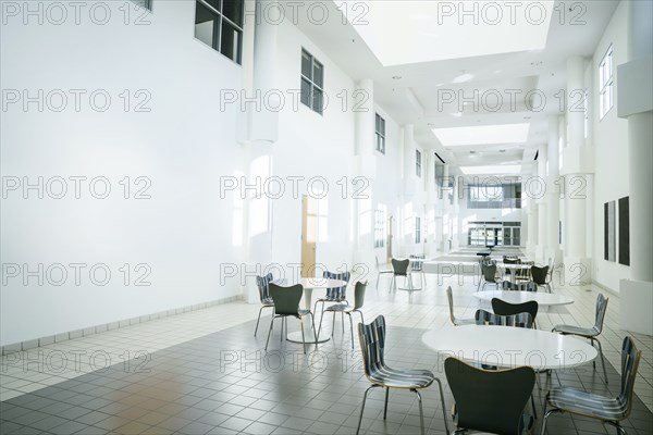 Empty table and chairs in lobby