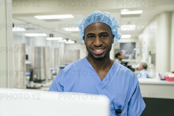 Portrait of smiling Black doctor in hospital