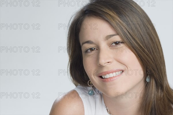 Close up of Hispanic woman smiling