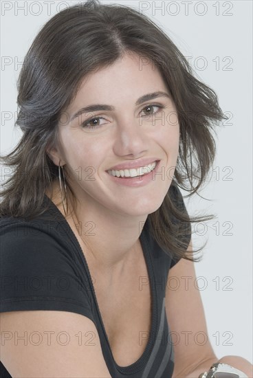 Close up of Middle Eastern woman smiling