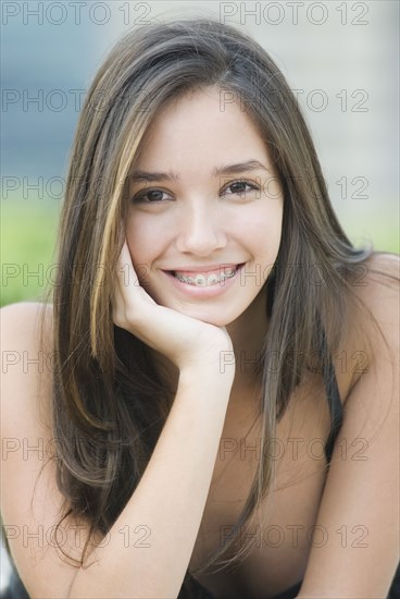 Hispanic woman with orthodontic braces