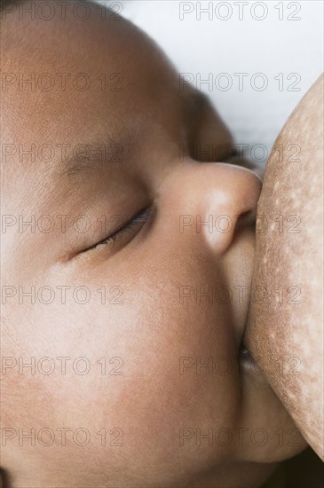 Close up of African baby nursing