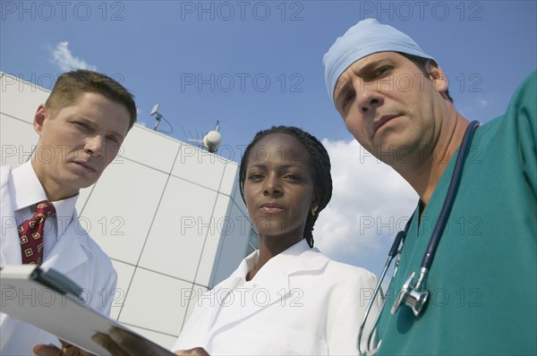 Multi-ethnic medical professionals outdoors