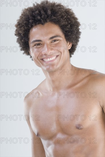 Mixed Race man with bare chest