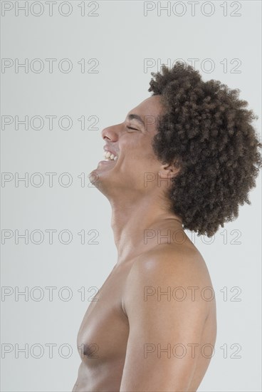 Mixed Race man with bare chest