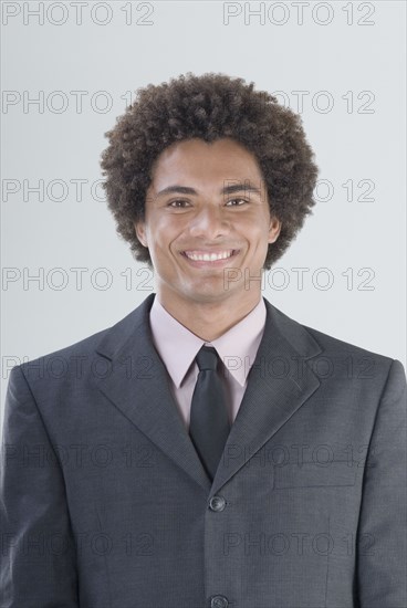 Mixed Race man wearing suit