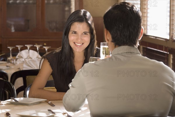 Hispanic couple at restaurant