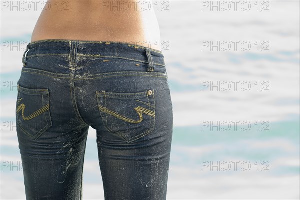 Rear view of woman wearing jeans