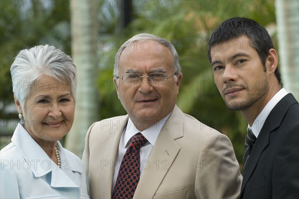 Portrait of Senior Hispanic parents and adult son