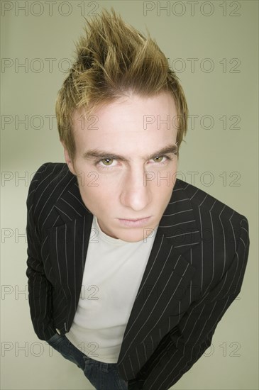 Young man with spiked hair