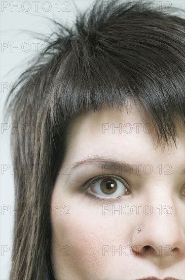 Hispanic woman with nose ring