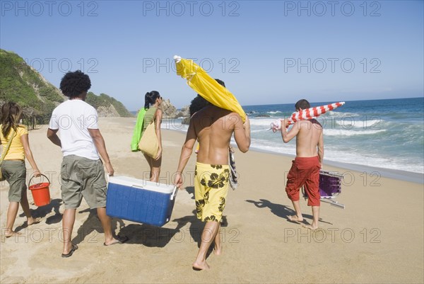 Multi-ethnic friends enjoying the beach