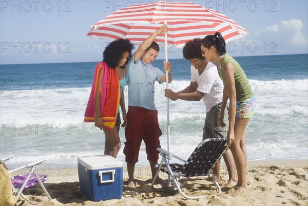 Multi-ethnic friends enjoying the beach