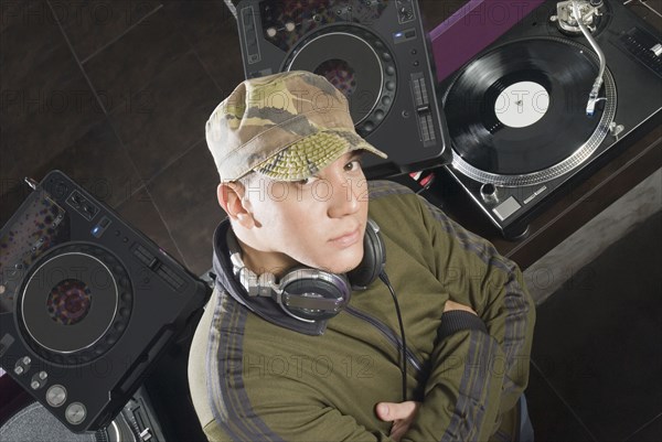 Hispanic DJ performing in nightclub