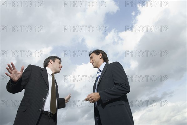 Hispanic businessman talking