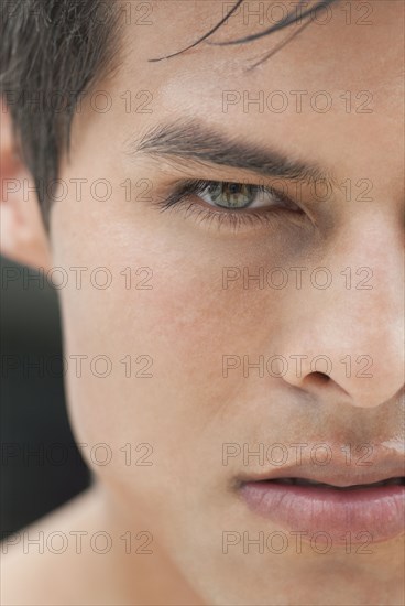 Close up of angry Hispanic man