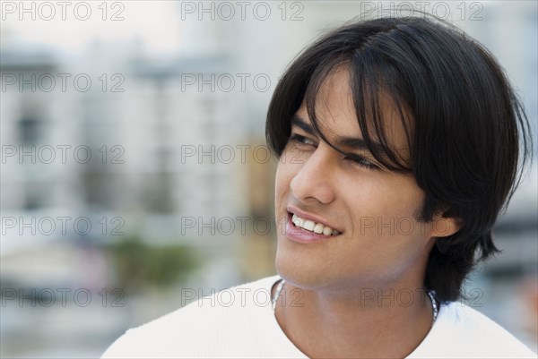 Smiling Hispanic man