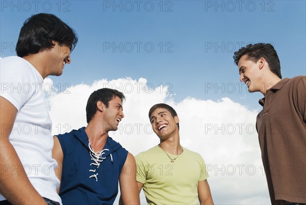 Friends laughing together outdoors