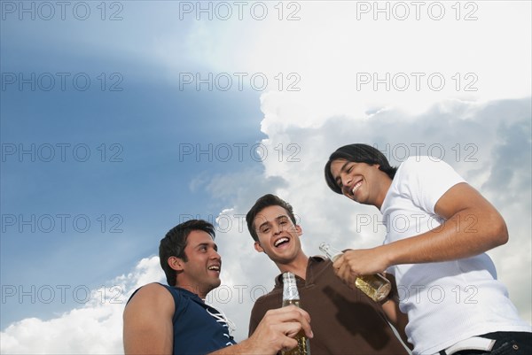 Friends hanging out and drinking beer