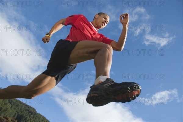 Hispanic man running