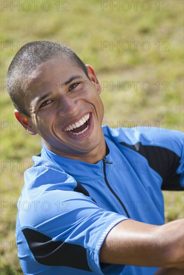 Smiling Hispanic athlete