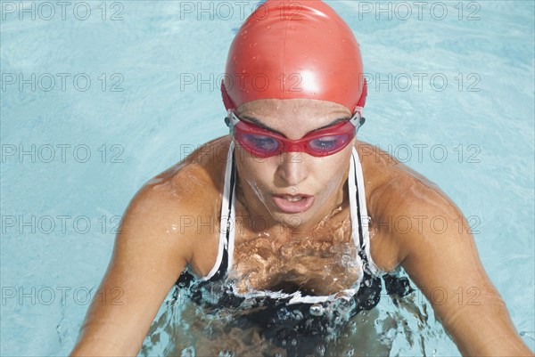 Hispanic swimmer in swimming pool