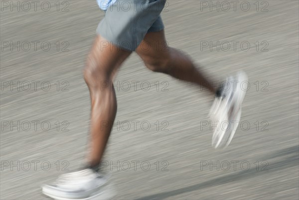 Blurred runner's legs running