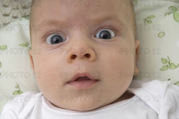 Close up of surprised baby