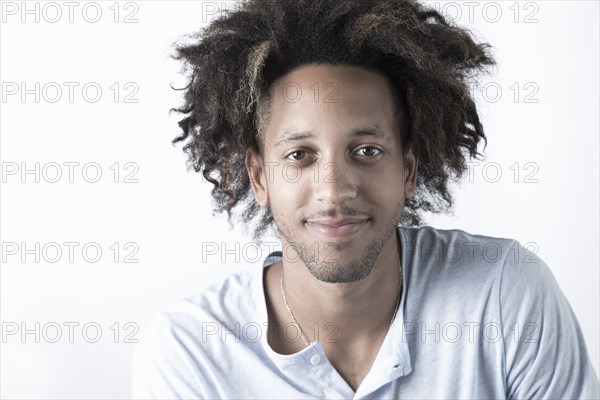 Mixed Race man looking at camera and smiling