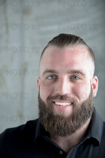 Portrait of smiling Caucasian man with beard