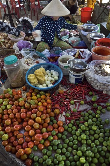 Vietnamese woman selling vegetables