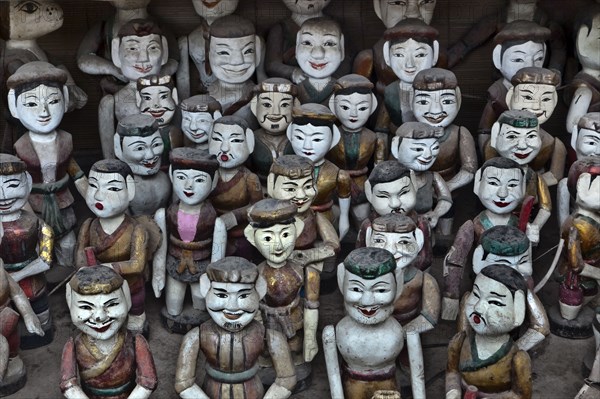 Rows of Vietnamese puppet figures