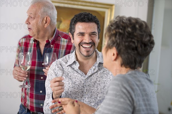 Hispanic family enjoying party