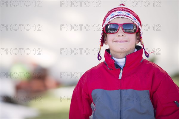 Hispanic boy in cold weather clothing