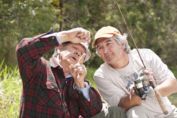 Hispanic men fishing