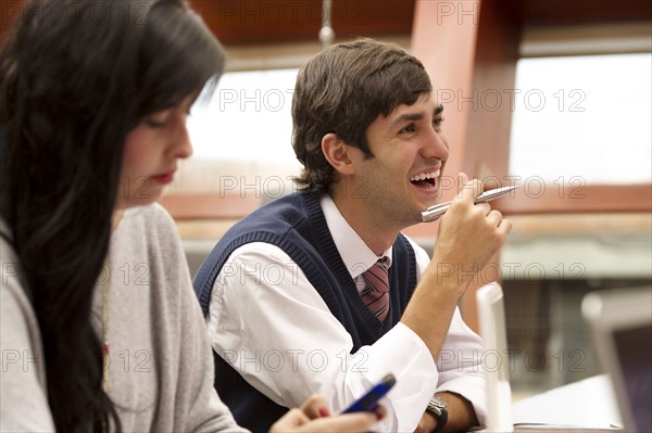 Hispanic business people in meeting