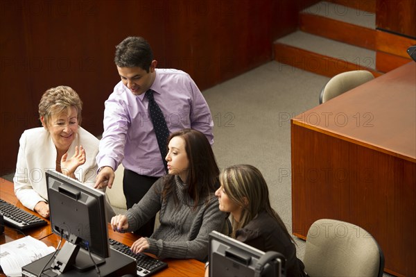 Hispanic business people working together