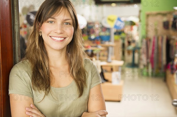 Hispanic woman standing in store