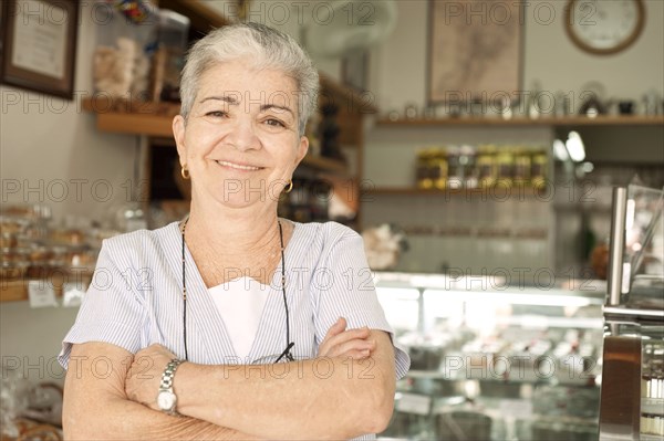 Smiling Hispanic woman in cafe