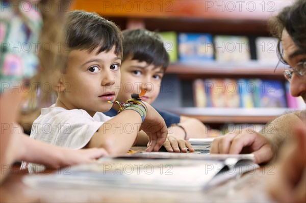 Hispanic students in library