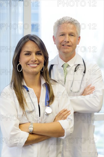 Doctors standing with arms crossed