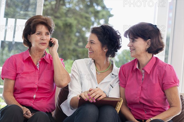 Hispanic women talking on cell phone