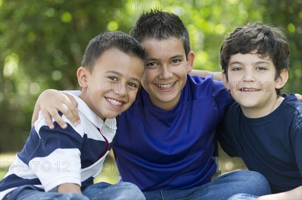 Hispanic boys smiling together