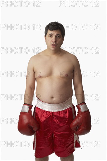 Portrait of overweight boxer