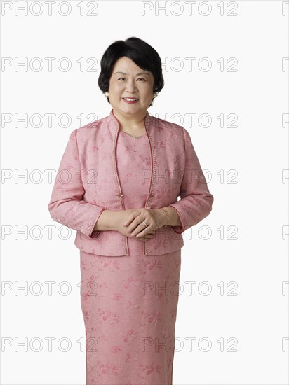 Confident Asian woman smiling