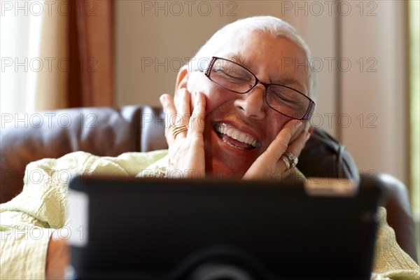 Caucasian woman using digital tablet