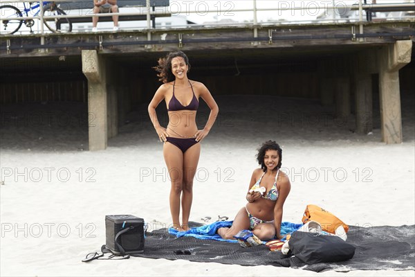 Mixed race friends enjoying beach